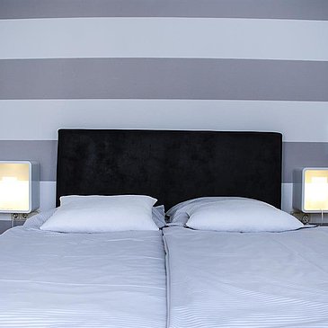slaapkamer for 2 personen in het appartement "Bratenhöfchen"